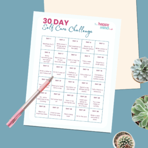 self care challenge peice of paper on desk with cactus to the site and a pen sitting on top
